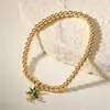Nuevo Producto Transfronterizo Aogu: Pulsera Minimalista y Única de Cobre con Baño de Oro de 18 Quilates, Incrustación de Circonia y Dijes de Corazón, Ojo y Libélula