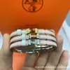 Nuevo Brazalete Aijia Versión Alta Letra H Versión Estrecha de 6 mm Mini Esmalte Estilo Pareja Europeo y Americano Venta Directa de Fábrica