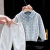 Ropa Infantil Estilo Coreano 2026 Otoño/Invierno Nueva Llegada Suéter de Punto con Cuello Polo a Cuadros Azul Claro Pantalones Blancos de Pierna Ancha para Niños Modernos
