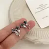 Pinzas para Orejas con Lazo y Circonita para Mujer 2025 Nuevo Diseño Único Negro de Nicho Pendientes para Mujer Sin Perforaciones