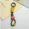 Corrente de Celular Rosto Sorridente 12cm Alça de Câmera Trançada Feita à Mão Chaveiro Curto Cordão de Celular Anti-Perda para Exterior