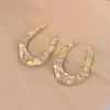 Moda Retro Europea y Americana Exagerados Dorados de Bambú Personalizados de Mariposa con Diamantes Pendientes Elegantes de Gama Alta para Mujer Venta al por Mayor