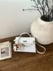 Bolsa Pequena de Platina de Alta Qualidade para Mulheres 2026 Nova Moda Versátil Bolsa Transversal Exquisita Super Moderna Bolsa Kelly