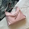 Bolsa Tote Grande para Deslocamento para Mulheres 2025 Nova Bolsa Casual de Nicho de Ombro Único Transversal Mochila Simples e Estilosa