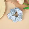 Goma para el pelo tipo scrunchie de color sólido estilo coreano, accesorio simple y no daña el cabello para coletas, venta al por mayor para mujeres