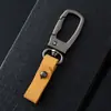 Chaveiro Pingente de Couro Bovino de Primeira Camada Transfronteiriço Chaveiro de Metal para Carro Atacado Chaveiro da Amazon Brindes de Conferência