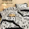 Manta de vellón de leche estilo Hepburn de invierno Juego de ropa de cama de cuatro piezas Estilo chino Pintura a tinta Lujo ligero Juego de funda de edredón de tres piezas