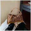 Bolso Leopardo Super Caliente de Nicho para Mujer Otoño/Invierno 2026 Nuevo Bolso Cruzado Versátil Bolso de Mano Almohada Exquisito Más Vendido