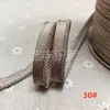 En stock 48 colores poliéster velcro con borde de cordón ribeteado tira de inserción de cuerda para ropa colchas sofás cojines tira de ribete