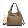 Bolsa transversal feminina transfronteiriça, bolsa de ombro 2026 moderna e versátil, bolsa balde casual e simples para o dia a dia, bolsa de mão para o dia a dia