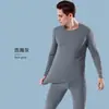 Ropa de otoño traje ropa interior térmica para hombre cuello redondo fino ajustado talla grande suéter base pantalones largos para hombre