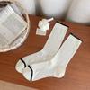 Calcetines blancos para mujer 2025 primavera y verano calcetines finos de tubo calcetines de rizo transpirables de malla moda simple calcetines de burbuja