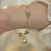 Diseño de corte Pulsera de campana de jade Hetian para mujer personalidad de alta calidad regalo año nuevo Hanfu para mujer lujo ligero ninguno