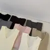 Estilo coreano! Suéter de malha minimalista elegante com decote V emagrecedor para o Outono/Inverno de 2026 para mulheres