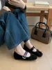 []Zapatos de Mujer de Otoño 2026 Nuevos de Gamuza Francesa con Punta Redonda, Tacón Bajo y Moño, de Correa Única