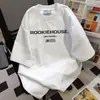 Camiseta de Manga Corta con Estampado de Letras de Marca de Moda Estilo Pareja Verano 2026 Nuevo Top Casual Holgado Versátil Vintage