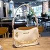 Pago de pedido Nueva Fuente Fábrica Bolso Mujer Moda Retro Lona Diseño de Nicho Cadena de Hombro Única Bolso de Mano para Debajo del Brazo