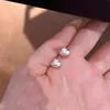Novos brincos de pérola com pino de prata para mulheres, brincos com design de nicho da moda, sensação de luxo leve e de alta qualidade, brincos femininos no atacado