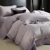 Nuevo juego de ropa de cama de cuatro piezas de algodón de fibra larga cepillado, con 60 hilos, que ofrece una sensación lujosa y de alta gama, disponible en estilos de sábana plana, sábana ajustable y colcha de algodón puro
