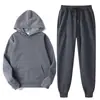 Nuevo conjunto de sudadera con capucha estilo europeo y americano, sudadera con capucha casual de corte holgado y pantalones de chándal, conjunto versátil de dos piezas