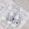 Botella de vacío para emulsión de 30ml50ml botella redonda de PET para perfume botella con spray de resorte botella cosmética de gran capacidad
