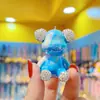 Llavero colgante de oso violento con líquido incrustado de diamantes, colgante de llavero de moda, oso de color degradado para colgar en la bolsa