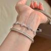 Pulseira Trevo de Quatro Folhas Micro-cravejada de Diamantes Super Brilhante de Luxo Leve Exquisita Nicho de Alto Nível Versátil Elegante Empilhável