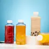 Botella de Embalaje para Té de Leche al por Mayor Botella Mini para Celebridades de Internet Botella de Agua Botella de Plástico Sellada para Té de Limón