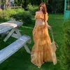 Impresionante conjunto de top corto con estampado floral sin hombros y falda larga para mujer, perfecto para un look chic de vacaciones en la playa