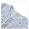 Nuevo estilo 2026 cárdigan de punto jacquard calado con cuentas 75% cachemira + 25% seda de morera, botones de perla para mujer