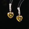 Pendientes de moda de lujo ligero con diseño de corazón de colores, microincrustaciones de circonita de diamante completo, aguja de plata S925, temperamento de alta calidad, venta al por mayor