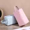 Bolsa de maquillaje acolchada, neceser portátil, etiquetado transfronterizo, suministro directo del fabricante, venta al por mayor, compartimentos de almacenamiento