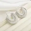 Pendientes de Moda Elegantes Europeos y Americanos Lujo Ligero Gama Alta Cristal Super Brillante Hebilla de Oreja Diseño de Nicho Personalidad Pendientes Elegantes