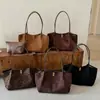 Bolso retro de moda para mujer de gran capacidad, nuevo bolso de hombro elegante para el otoño de 2026, bolso tote para el trabajo y el día a día con un diseño único