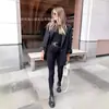 Jeans de Cintura Alta Primavera 2025 Calças Femininas Skinny de Perna Afunilada Pretas Tamanho Grande Calças de Mãe de Meia-idade