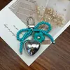Colgante de Corazón de Amor Plateado Estilo Coreano Nuevo Llavero de Coche con Lazo de Cristal Colgante para Llavero de Bolso