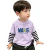 Camiseta de manga larga para niño, nuevo modelo primavera y otoño 2026, top de algodón puro para niños, capa interior para niños mayores, camiseta base de imitación de dos piezas
