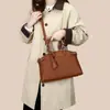 Bolso de Mujer para Exportación Transfronteriza 2025 Nuevo Bolso de Mano Urbano de Gran Capacidad con Textura de Grano Bolso Tote Simple de Hombro Cruzado