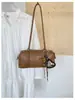 Bolso Retro de Alta Gama para el Trabajo Bolso Baguette para Mujer 2026 Nuevo Color Sólido Versátil Bolso de Hombro Único