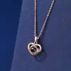 Versión coreana del nuevo collar con colgante de proyección de amor para mujer, cien idiomas Te amo, colgante de proyección en forma de corazón, cadena para la clavícula