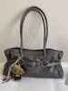 Bolso plisado retro simple para mujer, nuevo modelo 2026, bolso de hombro de gran capacidad para el trabajo, bolso de mano tote de otoño e invierno