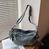 Bolso bandolera retro de mezclilla de nicho transfronterizo para mujer, nuevo estilo casual relajado 2026, bolso cruzado para el día a día