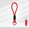 Lanyard de Color de Moda con Llavero de Peluche Trenzado Corto para Teléfono Hebilla Única Hebilla Sola Fabricante de Colgante de Llavero de Peluche En Stock Fuente