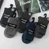 Calcetines nuevos de doble aguja para dama color sólido casual de algodón calcetines de otoño e invierno gruesos cálidos algodón peinado calcetines de mujer al por mayor
