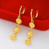 Pendientes de corazón chapados en oro de imitación de latón, venta al por mayor, para mujer, con forma de corazón de melocotón, joyería con temperamento de oro arena de Vietnam.