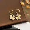 Pendientes de Ojo de Gato de Trébol con Pedrería Estilo Coreano Exquisito Elegante Temperamento Pendientes de Gama Alta Pendientes Versátiles de Nicho para Mujeres
