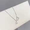 Moda coreana 2023 nuevo collar de luna de circonita y estrella de cinco puntas cadena para clavícula de mujer cadena de cuello de perla de temperamento todo-partido