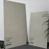 Azulejos vidriados réplica oro espiga 600x1200 azulejos de suelo para sala de estar 750x1500 patrón de veta de madera azulejos de suelo para cadena de tiendas