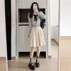 Falda de traje negra estilo preppy para mujer, nueva colección otoño 2026, de cintura alta, falda de línea A adelgazante, falda plisada casual
