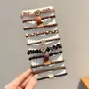 Dulces y Versátiles Gomas para el Cabello Infantiles para Niñas, Suaves con el Cabello, Bandas Elásticas de Alta Elasticidad, Anillos para Moños de Bebé, Accesorios para el Cabello